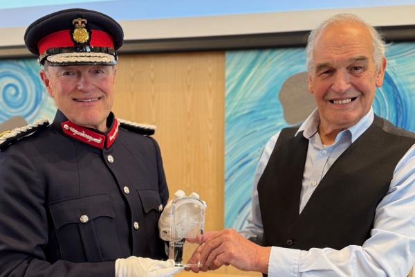 Lord-Lieutenant presenting Keswick Community Housing Trust with KAVS on 30 May 2025